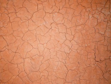 Red cracked plaster. clipart