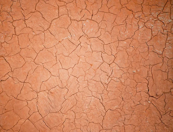 Red cracked plaster. — Stock Photo, Image