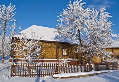 Old wooden house in village clipart