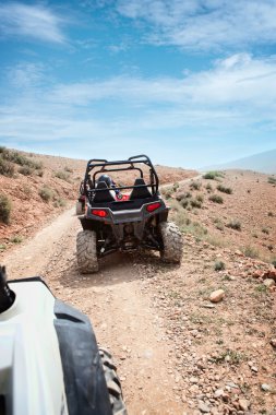 Desert quad riding clipart