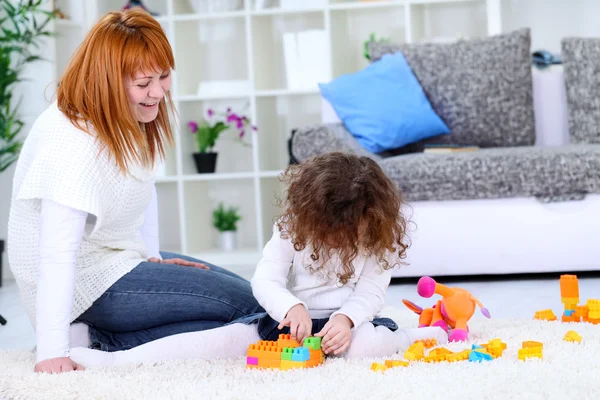 Laughing mother with her child — Stock Photo, Image