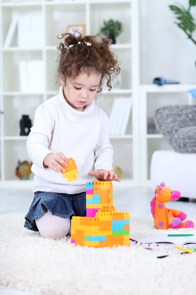 Stock image Little girl play with building blocks