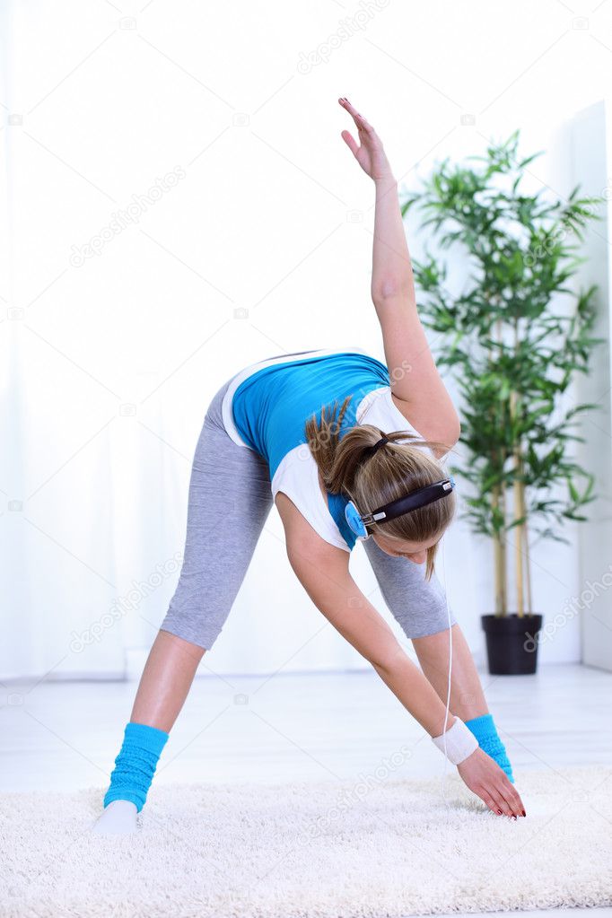 Girl doing stretching exercises