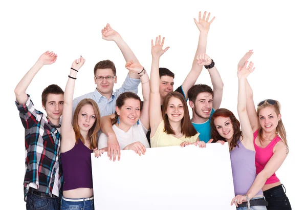 Gruppo di amici eccitati che tengono uno striscione isolato sul bianco — Foto Stock