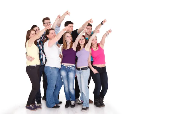 Large students group pointing at copy space Stock Picture