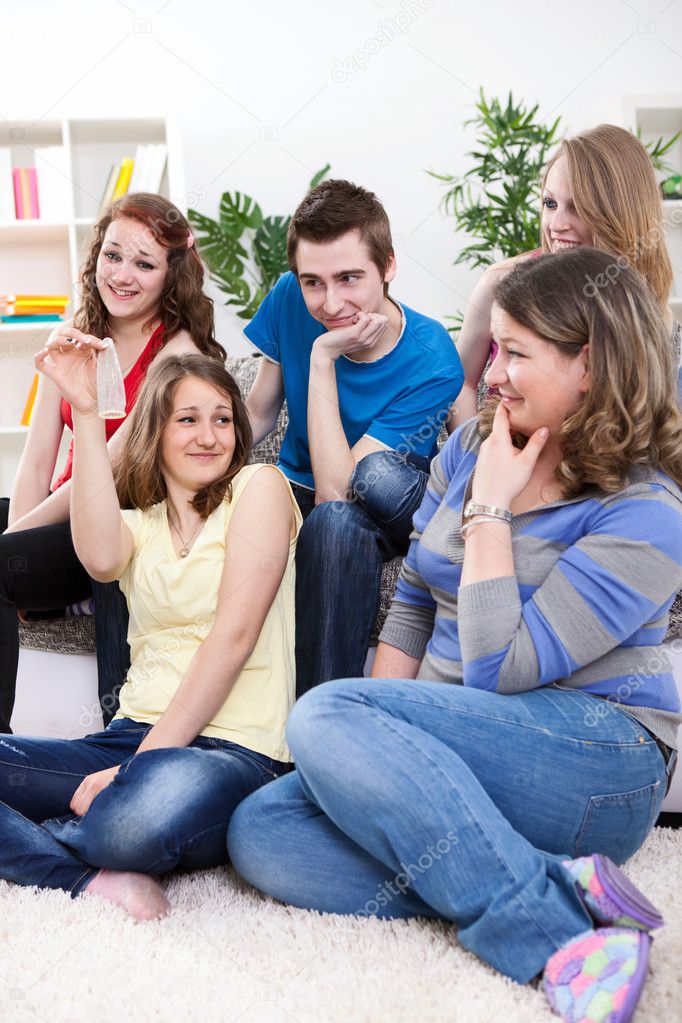 Teenagers having discussion about protection