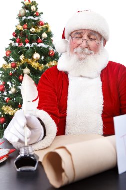 Santa writing Christmas list clipart