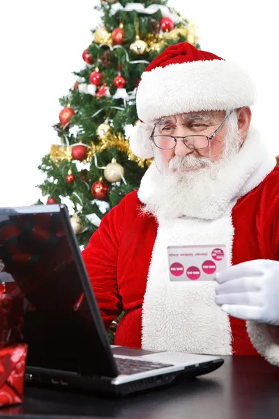 Santa placení kreditní kartou — Stock fotografie