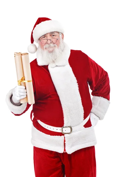 Santa drží svitek papíru — Stock fotografie