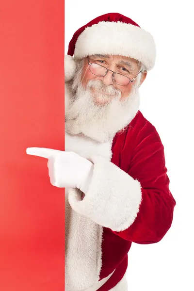 Santa señalando en rojo cantar — Foto de Stock