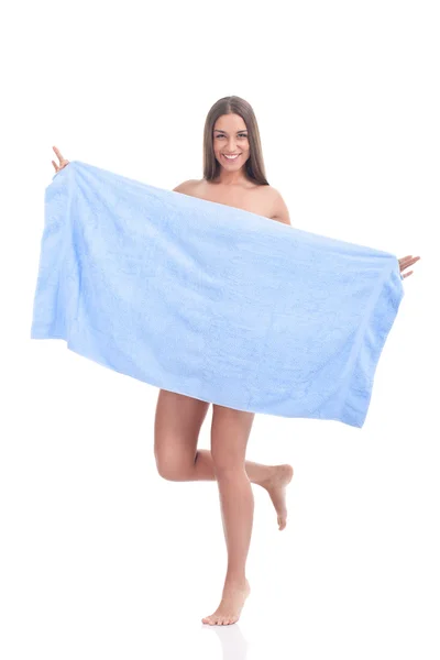 Mulher escondida atrás da toalha — Fotografia de Stock