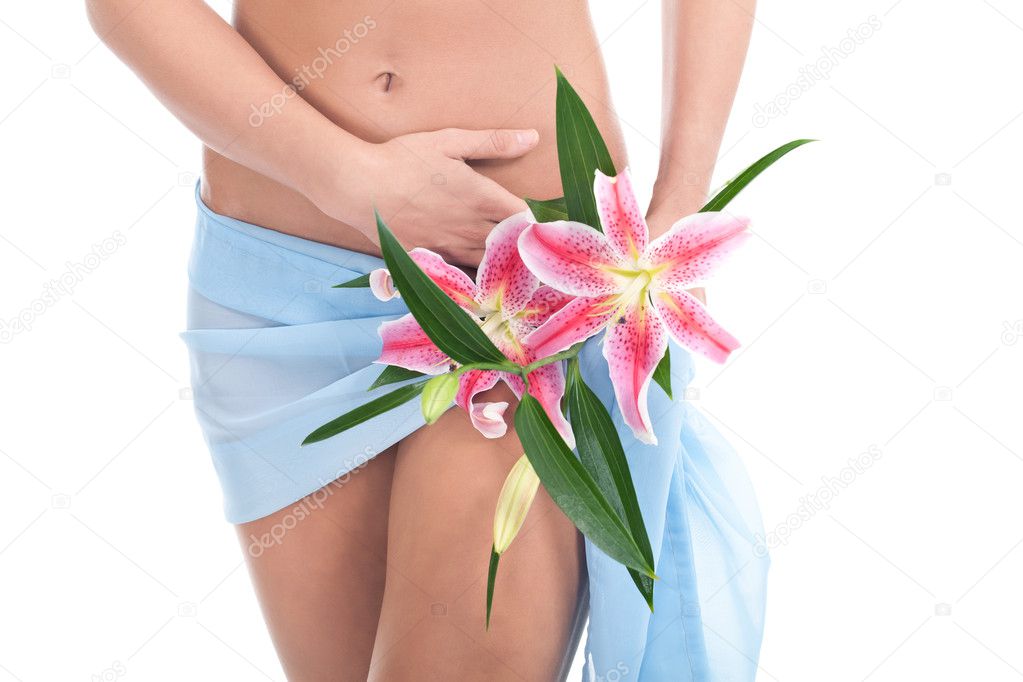 Perfect woman's body with cute flower on her hip