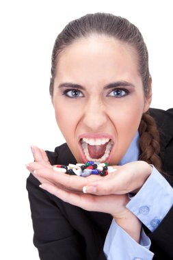 Angry businesswoman holding pills clipart