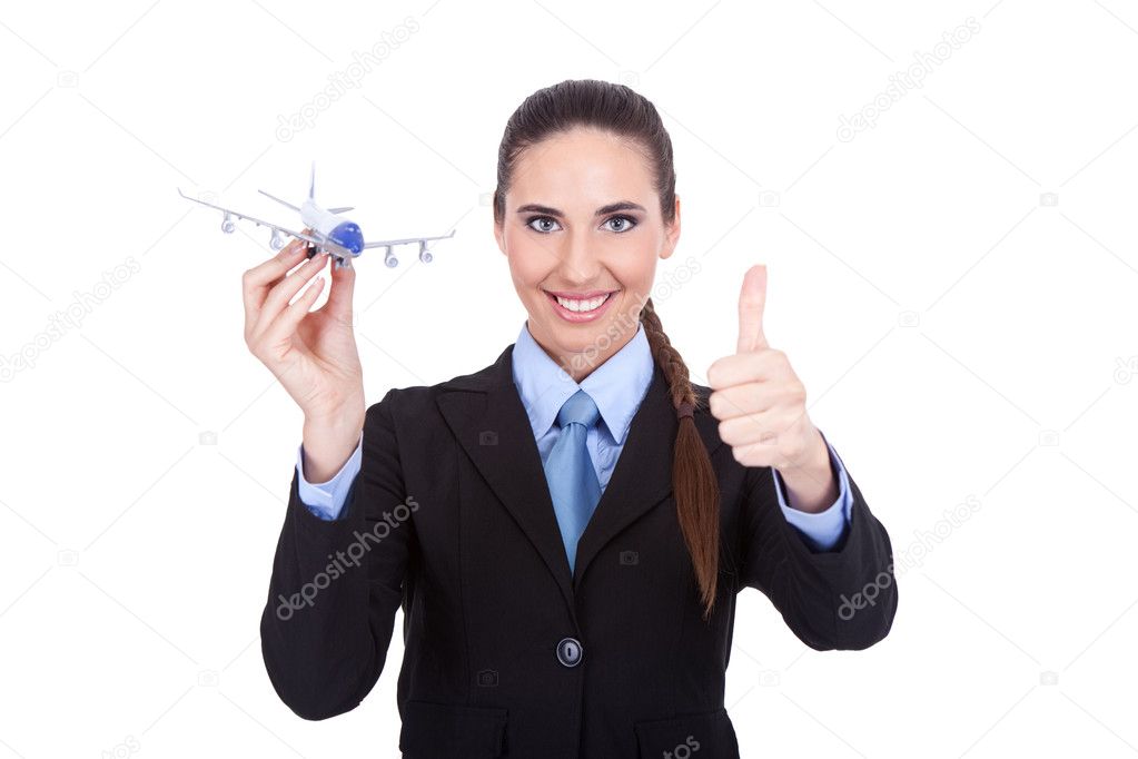 Attractive stewardess holding plane