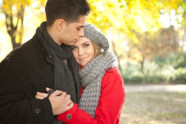 Young couple embracing clipart