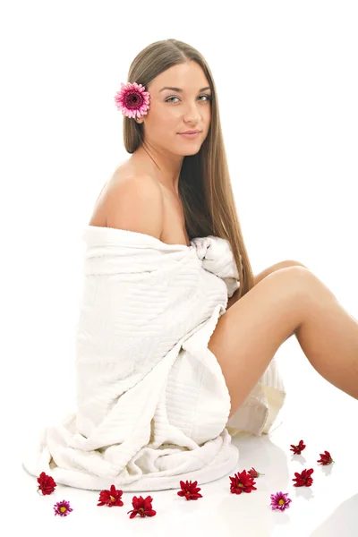 Spa flicka med blomma — Stockfoto