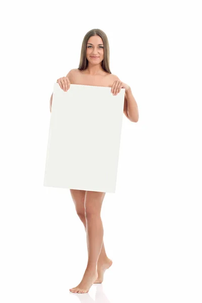 Beautiful naked woman holding a blank sign — Stock Photo, Image