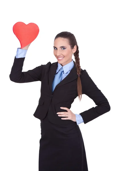 Glimlachende zakenvrouw met vorm hart — Stockfoto