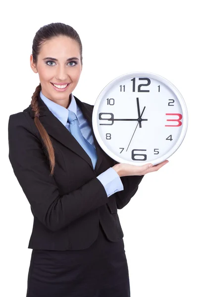Empresária segurando relógio — Fotografia de Stock