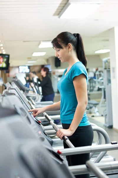 On a treadmill — Stock Photo, Image
