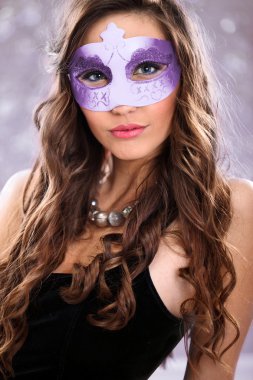 Girl with carnival mask clipart