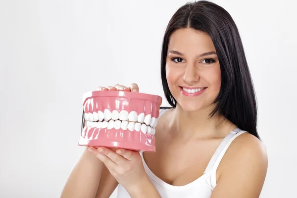 Young woman with jaws — Stock Photo, Image
