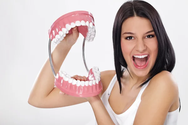 Funny young woman with jaws — Stock Photo, Image