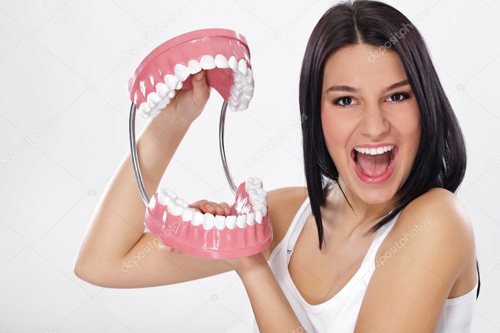 Funny young woman with jaws