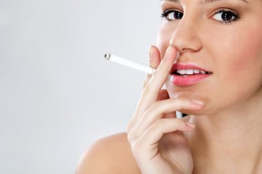 Sensual woman with cigarette clipart