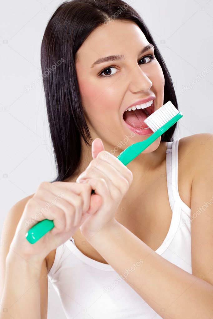 Funny girl with toothbrush