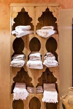 Wooden shelve with towels clipart