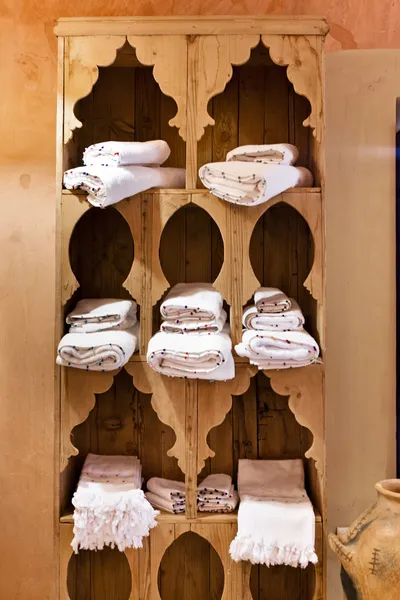 Wooden shelve with towels — Stock Photo, Image