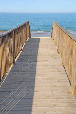 Walkway to a public beach access vertical clipart