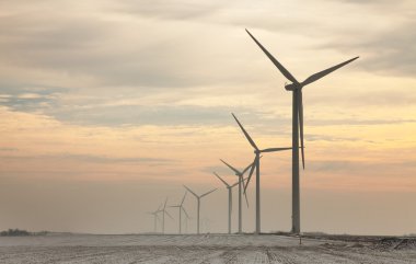 Windturbines at dusk clipart