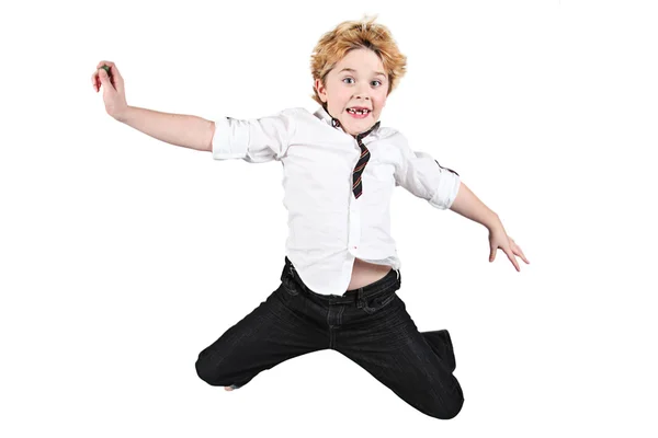 Bonito menino pulando no ar no fundo branco — Fotografia de Stock
