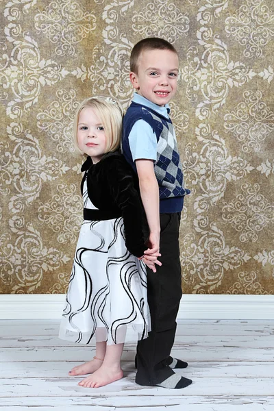 Adorable little brother and Sister on studio background — Stock Photo, Image