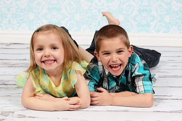Adorable little brother and Sister on studio background Royalty Free Stock Photos