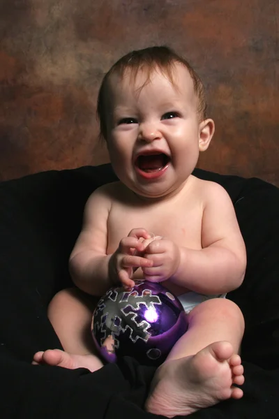 Baby Girl with Christmas Blub — Stock Photo, Image
