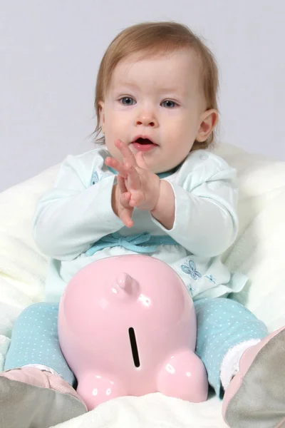 Child Holding Piggy Bank and Claping Hands — Stock Photo, Image