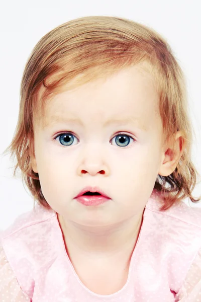 Bebé niña en vestido con ojos brillantes —  Fotos de Stock