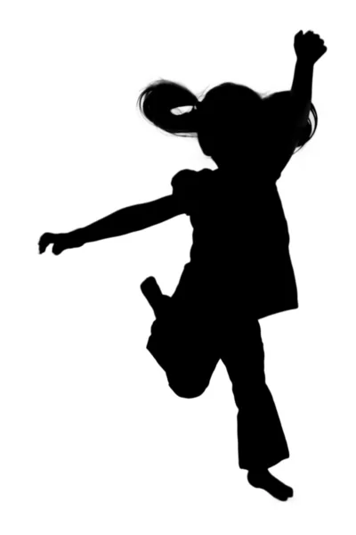 Havada beyaz zemin üzerine atlama izole sevimli küçük kız — Stok fotoğraf