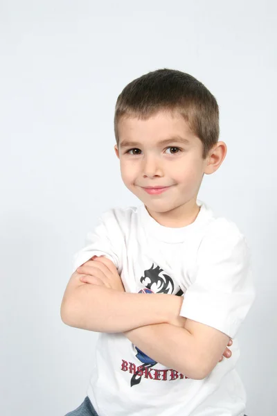 Boy with arms folded — Stock Photo, Image
