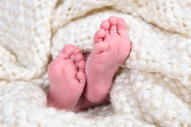 Babies foot taken closeup clipart