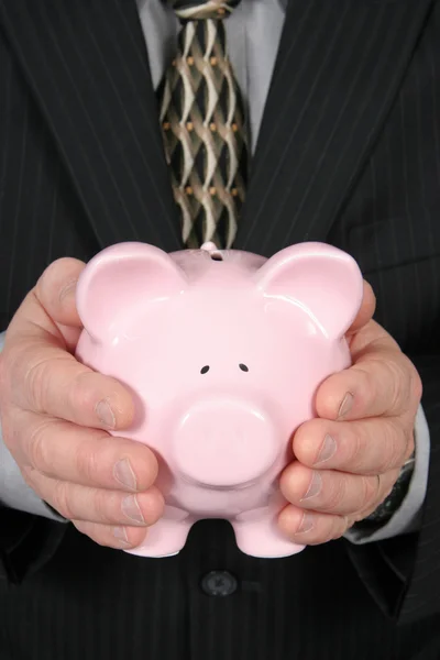 Business Man Holding Piggy Bank — Stock Photo, Image