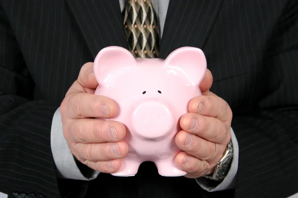 Business Man Holding Piggy Bank — Stock Photo, Image
