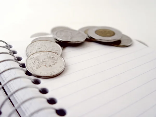 Coins on Book — Stock Photo, Image