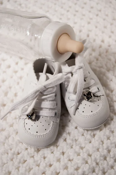 Baby Shoes and Bottle — Stock Photo, Image