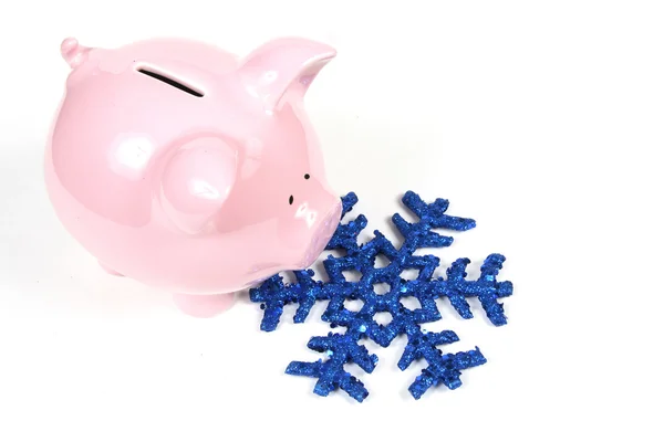 Piggy Bank y copo de nieve - Coste de calefacción —  Fotos de Stock