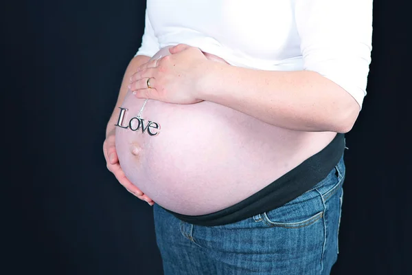 Pregnant woman at 8 months — Stok fotoğraf