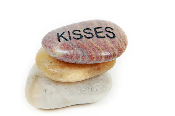 Besos grabados en piedra —  Fotos de Stock